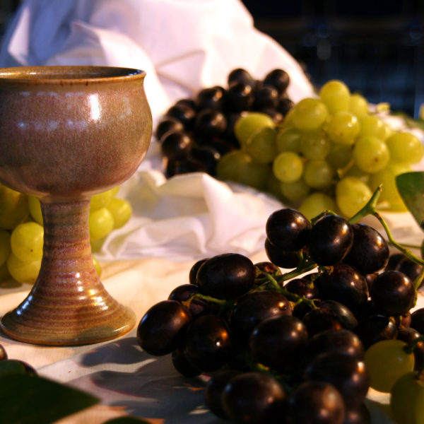 Cup and grapes of communion